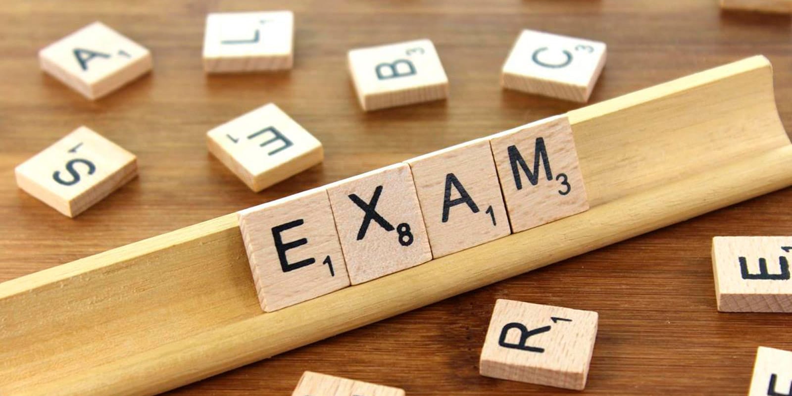 Exam with Scrabble Tiles